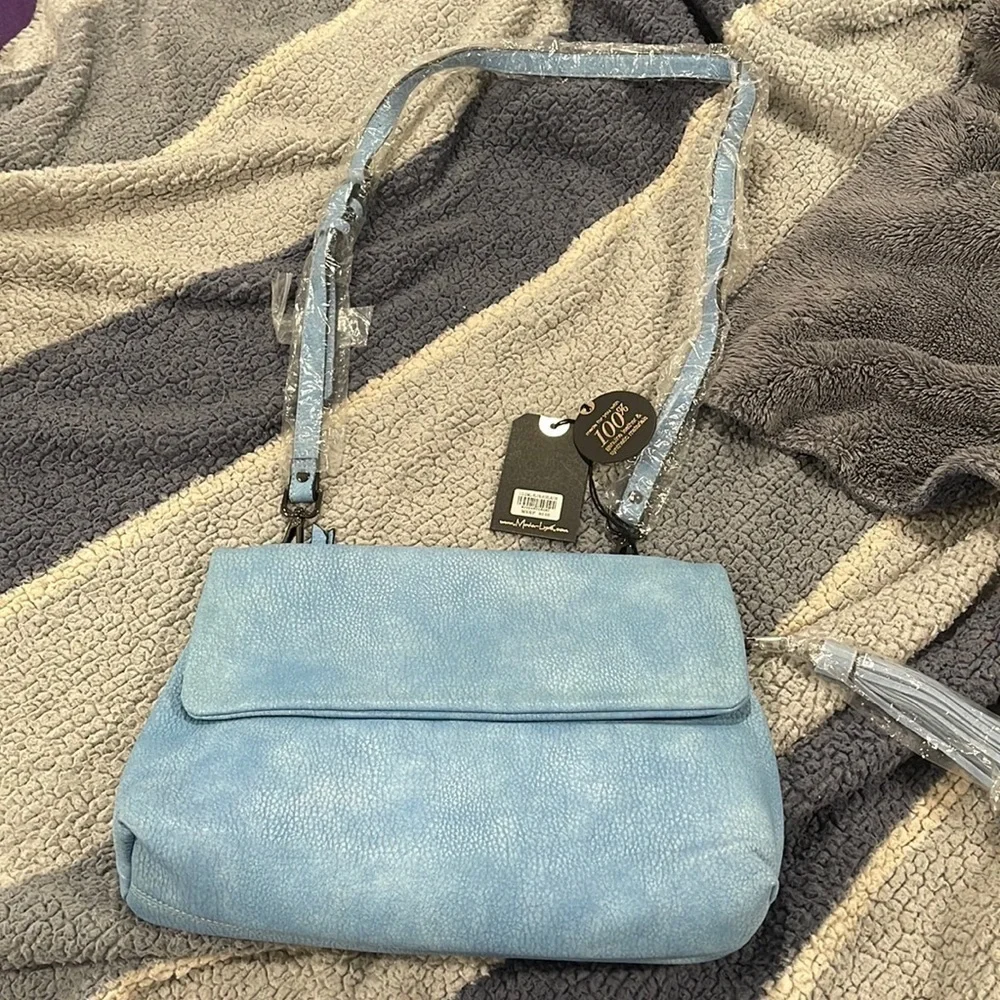 Light sky blue bag leather